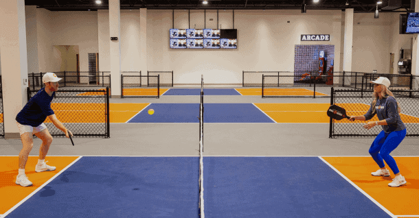 A player practicing on an indoor court